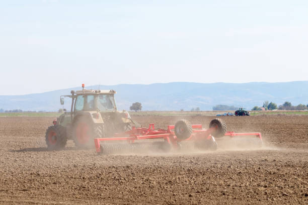 istock Tractors preparing field, Agriculture tractors 1264554948
