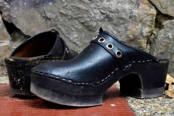 istock old shoes in the street 1264555863