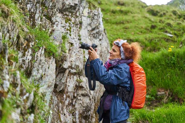 istock Nature photographer shooting in the highlands 1264557237