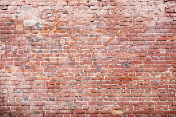 Red brick wall, wide panorama of masonry, background, texture grunge background