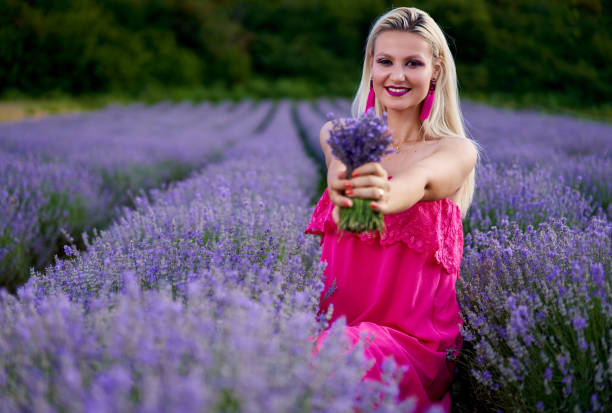 istock Young blondie in a lavender field 1264559614