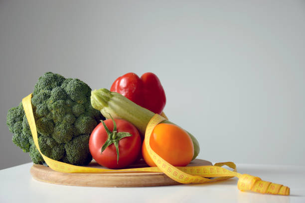 istock Vegetables and measuring tape 1264560248