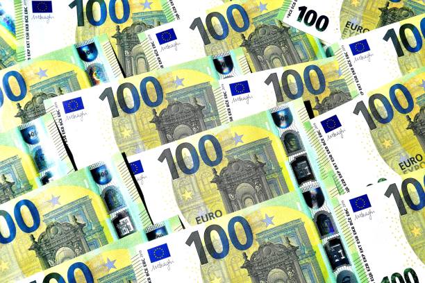istock Background of 100 Euro banknotes 1264564251