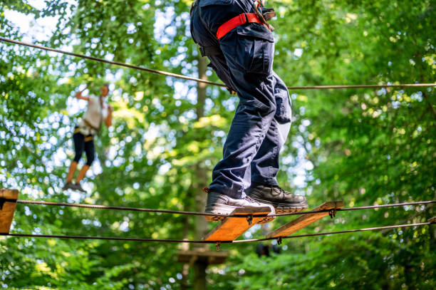 istock Rope walking at adventure park 1264565857