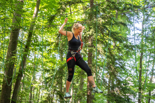 istock Rope walking at adventure park 1264565872