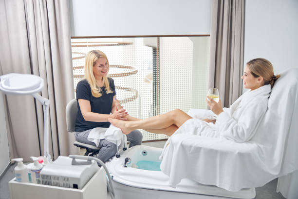 istock Happy young woman relaxing in spa salon 1264568219