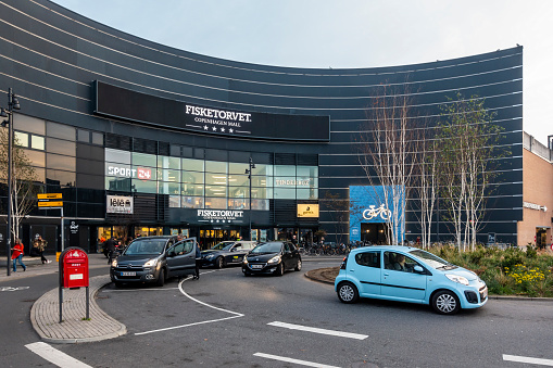 Copenhagen, Denmark - Oct 18, 2018: Entrance view to the Fisketorvet Copenhagen Mall. People and vehicle at the front foreground.