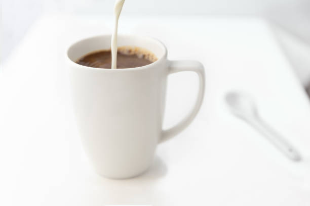 Coffee with milk on the table