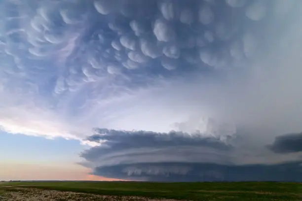 Supercell thunderstorm with dramatic mammatus clouds near Arnold, Nebraska.