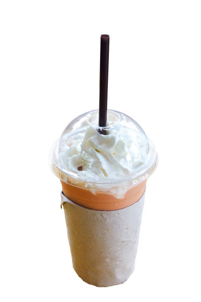 istock Ice Thai milk tea in plastic glass isolated on white 1264577082
