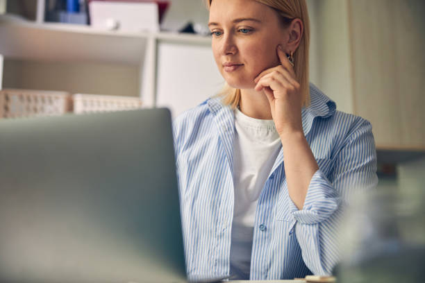 istock Calm female being concentrated on office work 1264578049