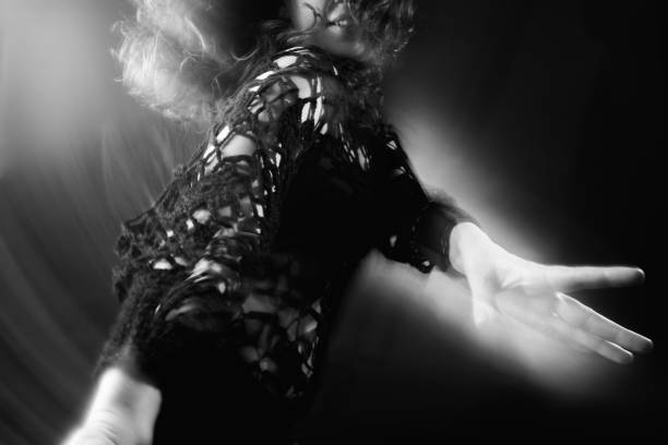 istock dancing woman silhouette enlightenment energy 1264580575