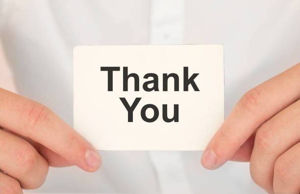 istock Hand writing Thank You with blue marker on transparent wipe board. 1264580859