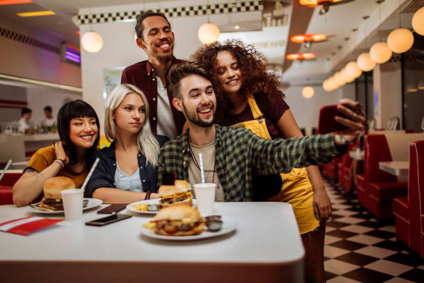 istock Selfies over burgers 1264580969