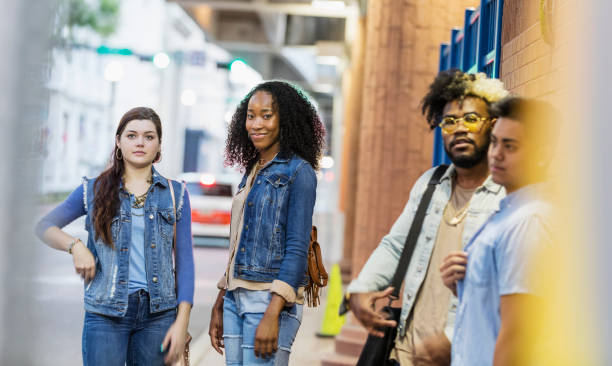 istock Multi-ethnic young adults hanging out in the city 1264590868