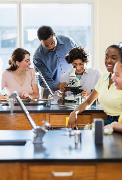 istock African-American man teaching high school science lab 1264594579