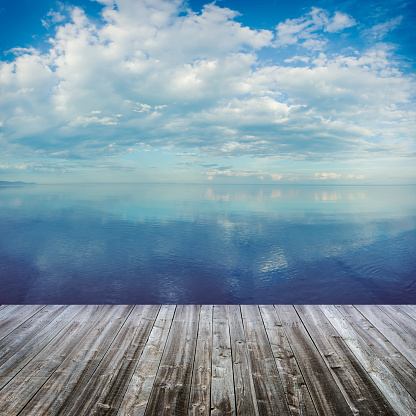 wooden deck at a beautiful lake