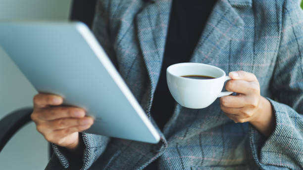 istock a business woman using digital tablet in office 1264603708