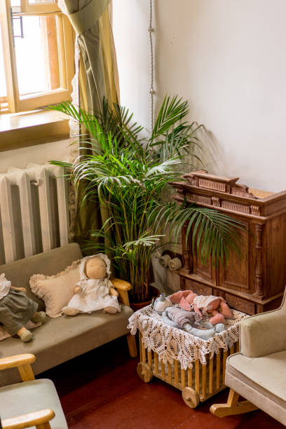 istock Stylish compositon of retro home interior with plants, elegant accessories. Minimalistic concept. Nice home decor. 1264609964