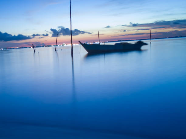 istock Sunset at Lagoi Beach, Riau Islands 1264610765