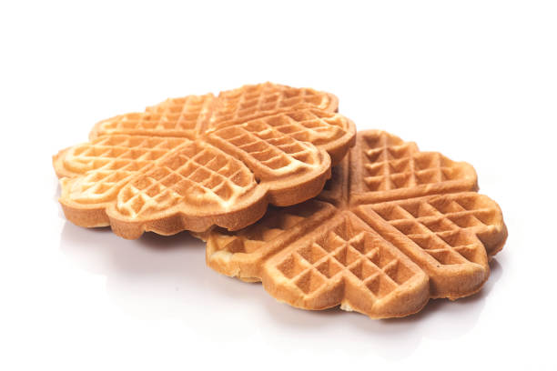 istock Freshly baked waffles isolated on white 1264612077