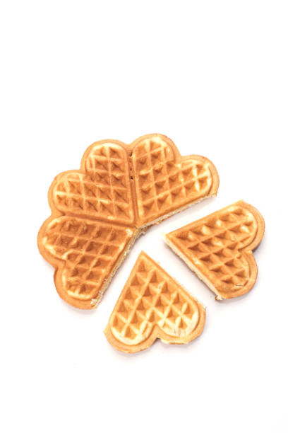 istock Freshly baked waffles isolated on white 1264612091