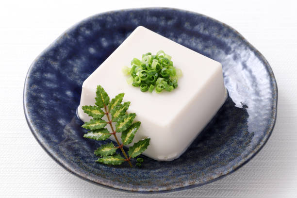 Japanese food, Japanese soft cold tofu in a bowl Japanese food, Japanese soft cold tofu in a bowl on white background zanthoxylum stock pictures, royalty-free photos & images