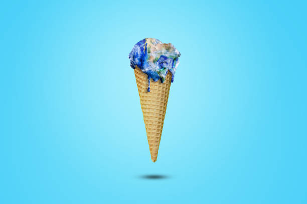 istock Global Warming and Pollution Concept : Ice cream planet earth melting in ice cream cone. 1264621625