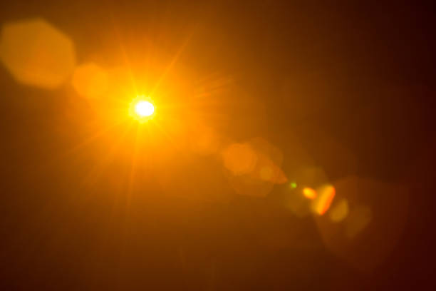 istock Abstract Natural Sun flare on the black 1264622248