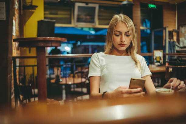 istock Young hipster woman in pub 1264625143