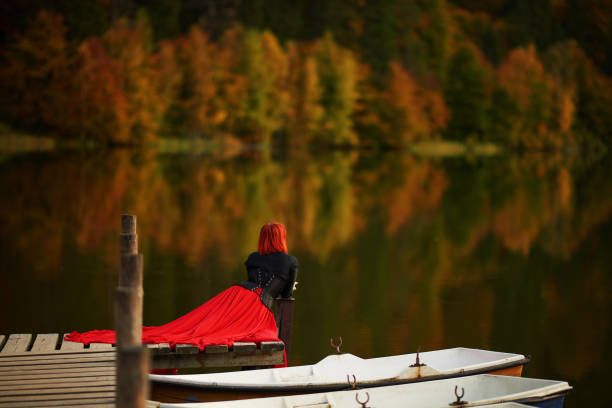 istock Royal queen relaxing at the lake 1264626825