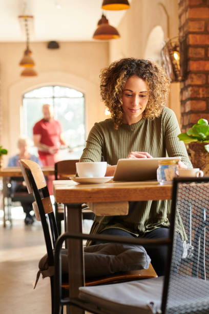 istock catching up at the coffee shop 1264628246