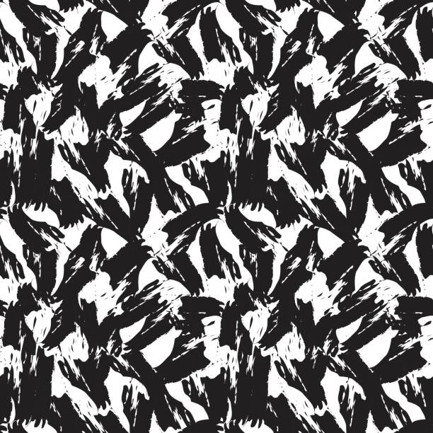 Black and White Camouflage Brush strokes Seamless Pattern Background Black and White camouflage brush strokes seamless pattern background for fashion prints, graphics, backgrounds and crafts black and white cheetah print stock illustrations