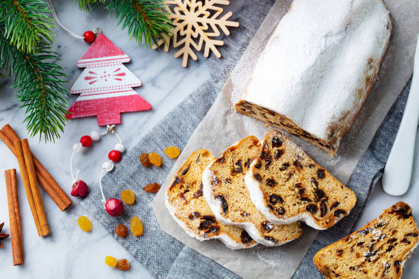istock Christmas stollen. Traditional German festive dessert. Marble background. Top view. 1264632526