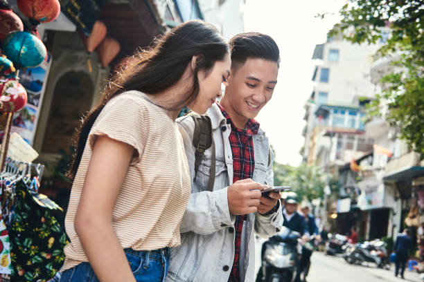 Smiling Friends Discussing Over Phone