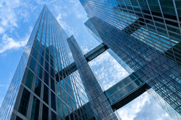 istock Low Angle View Of Modern Buildings Against Blue Sky 1264634478
