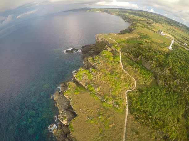 istock Drones near a lighthouse on Okinoerabu Island, Japan 1264637972