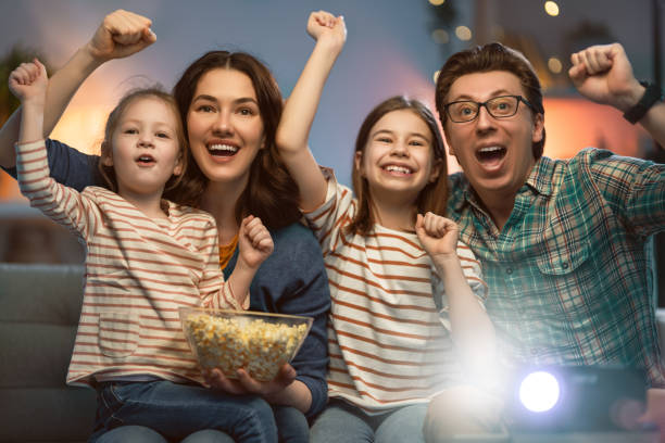 istock Mother, father and daughters spending time 1264639313