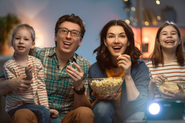 istock Mother, father and daughters spending time 1264639508