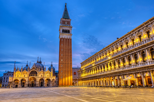 Piazza San Marco in Venice with the bell tower and the cathedral at dawn