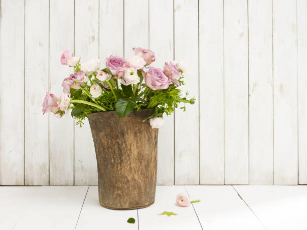 istock Flowers on wooden backgrounds, peony 1264643644
