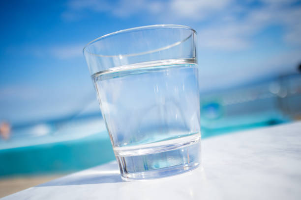 istock Glass of water at pool 1264647083