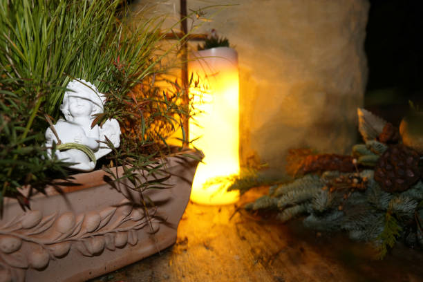istock Lighting candles for the dead on All Saints Day 1264647174