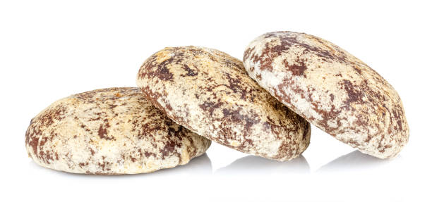 istock Three gingerbread cookies isolated on a white background 1264647711