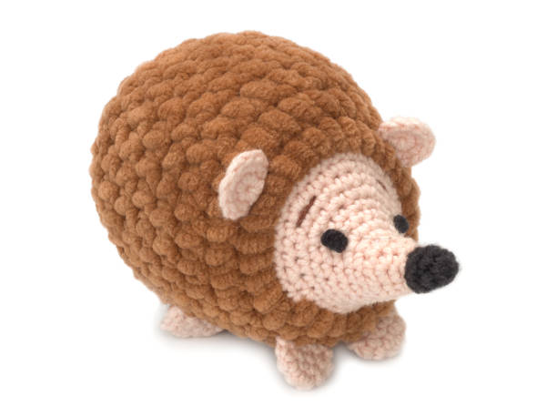 istock Hedgehog on a white background. Baby soft toy 1264649223