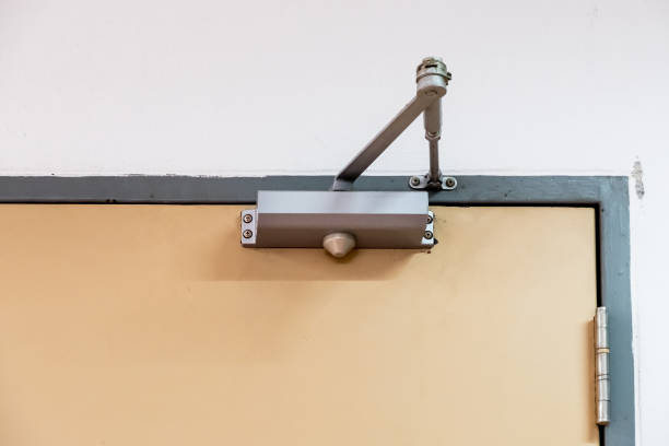Clean door closers for a private room. Clean door closers for a private room of the manager in the office building. thai door stock pictures, royalty-free photos & images