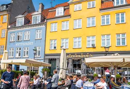 Copenhagen, Denmark - September 02, 2021: People in front of Cafe Sorgenfri in the historic city centre.