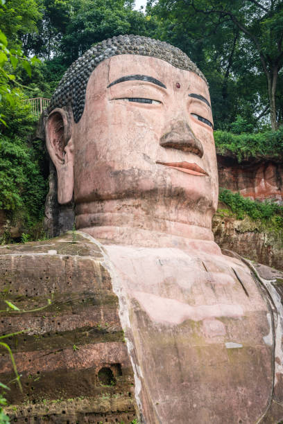 istock Majestic Giant Leshan Buddha head, face and torso 1264653411