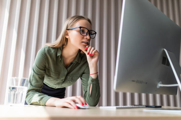 istock Successful young business woman working at the office 1264654872