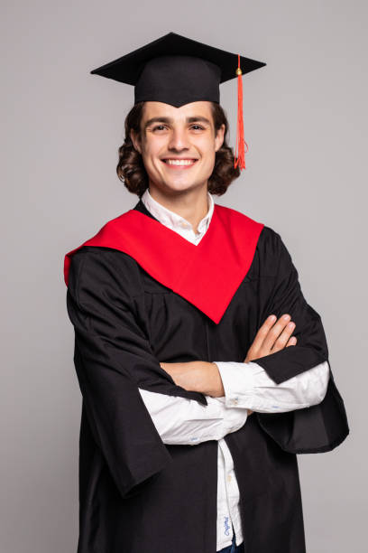 istock Young graduation man isolated on white background 1264657264